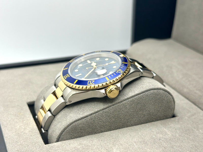Rolex Submariner Date Blue 16613 40mm Tropical Faded Blue Dial 18k Gol