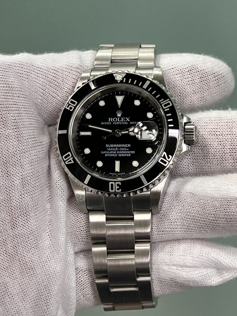 Rolex Submariner  Date 16610 Black Dial Stainless Steel Box Paper 2004