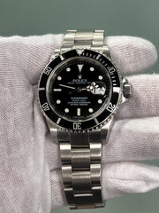 Rolex Submariner  Date 16610 Black Dial Stainless Steel Box Paper 2004