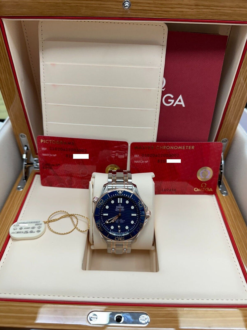 Omega 210.20.42.20.03.002 Seamaster Diver Blue 18K Rose Gold Steel Box Paper