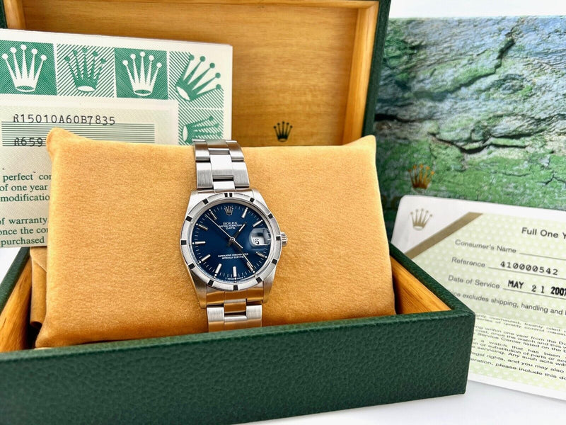 Rolex Date 15010 34mm Blue Dial Stainless Steel Engine-Turned Bezel Box Paper