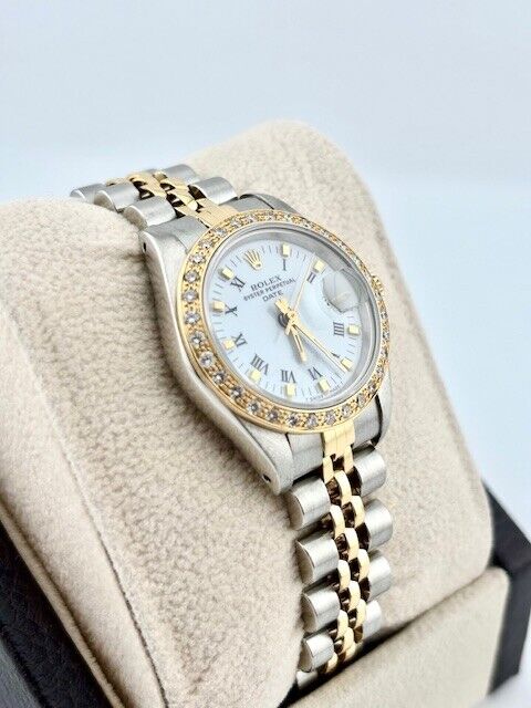 Rolex Date Ladies 69173 White Dial Diamond Bezel 18K Yellow Gold Stainless Steel