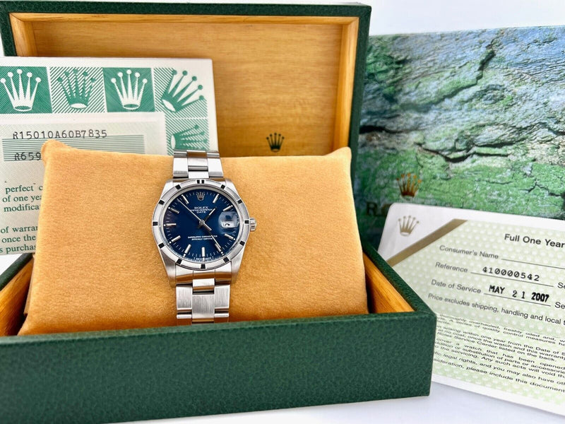 Rolex Date 15010 34mm Blue Dial Stainless Steel Engine-Turned Bezel Box Paper