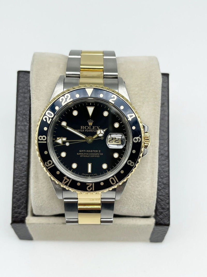 Rolex GMT Master II 16713 Black Dial 18K Yellow Gold Steel Box Service Paper